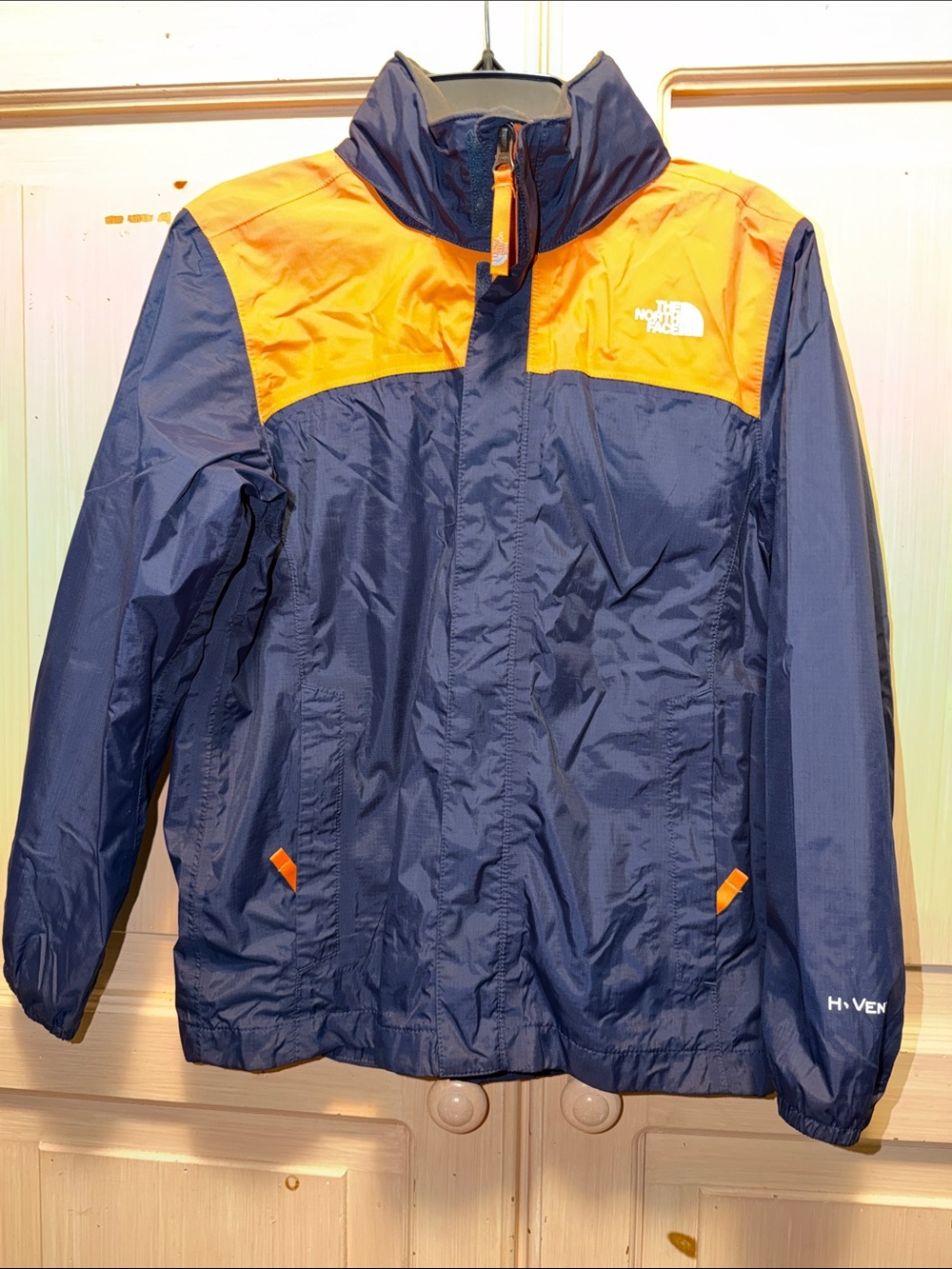 The North Face Kids Navy Blue and Orange Raincoat
